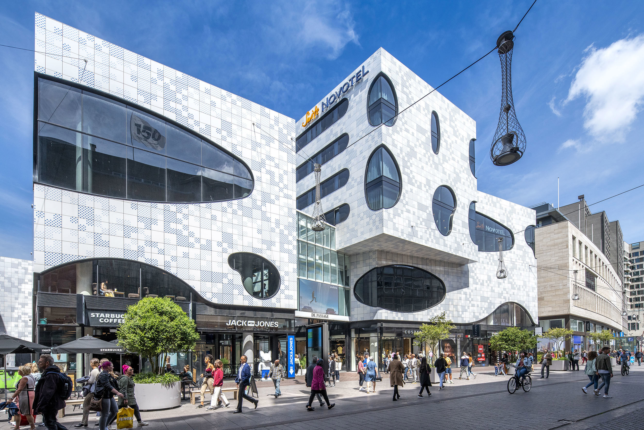 This slide displays De Passage Den Haag (3).